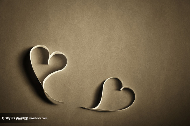 Hearts of white paper on a gray background ba Hearts of white paper on a gray background ba