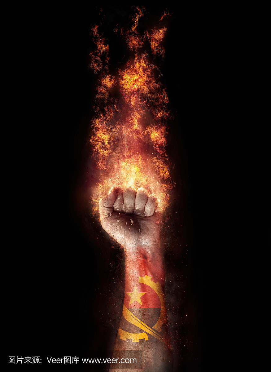 安哥拉国旗在一只手中起火