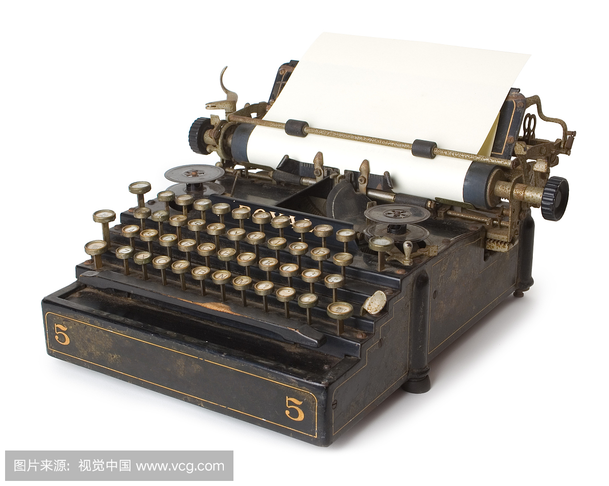 一个旧的古董打字机与空白纸
