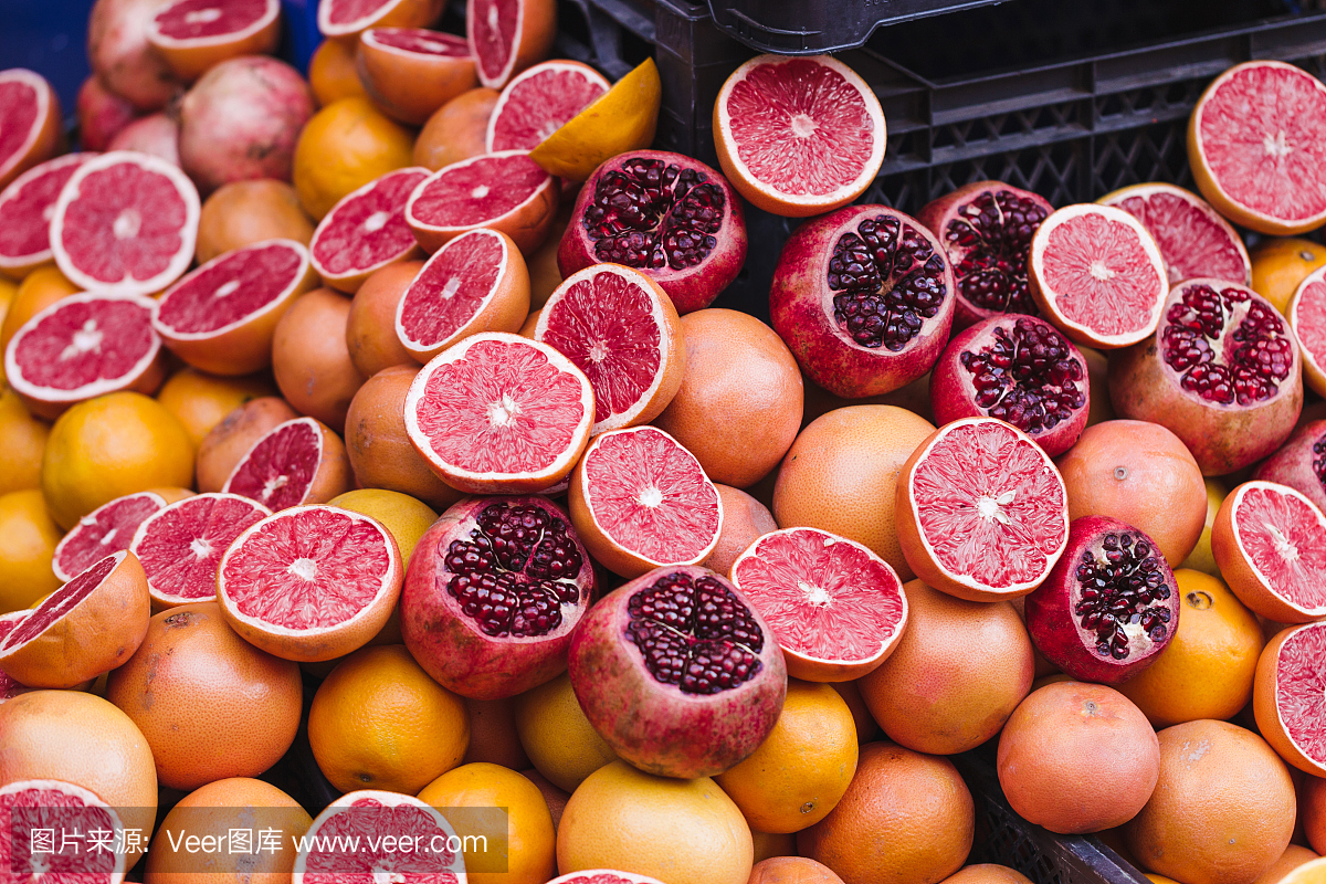 混合热带柑橘类水果背景。新鲜水果关闭。健康