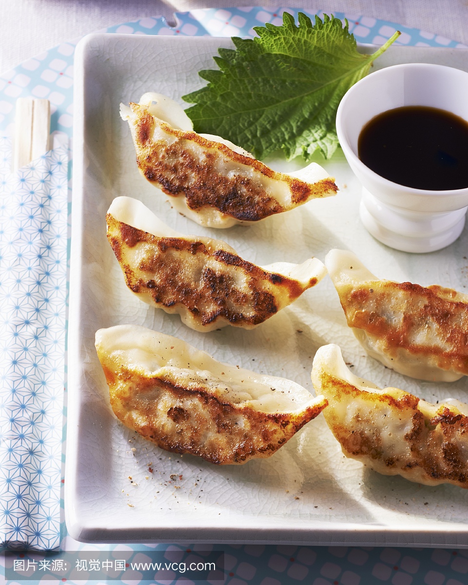 Gyoza (Japanese pastry parcels) with soy sauc