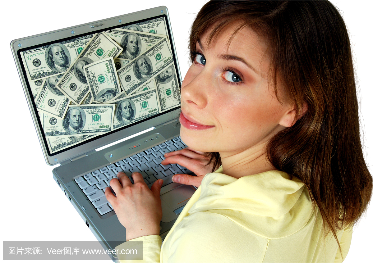 年轻美丽的女人用电脑赚钱。