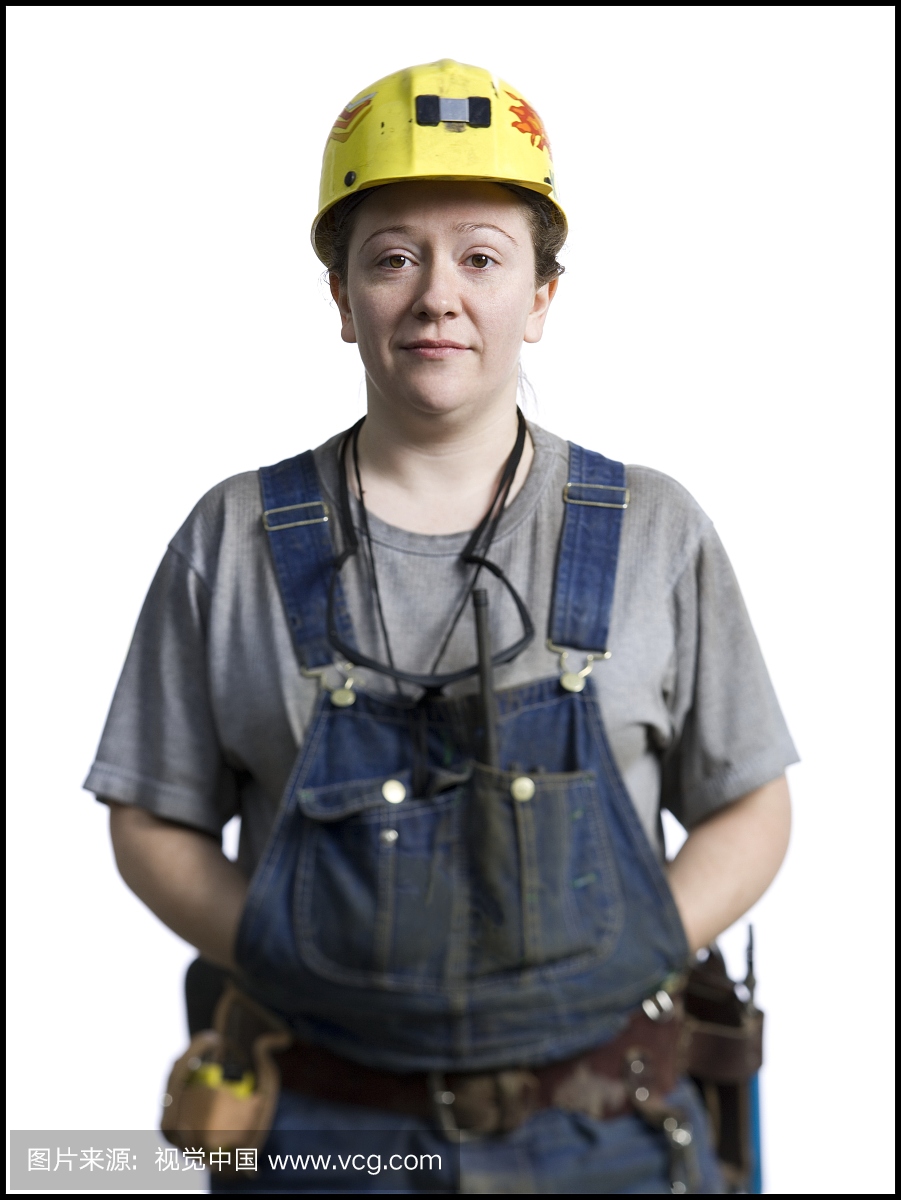 一名女性煤矿矿工的肖像,双手站在她的口袋里