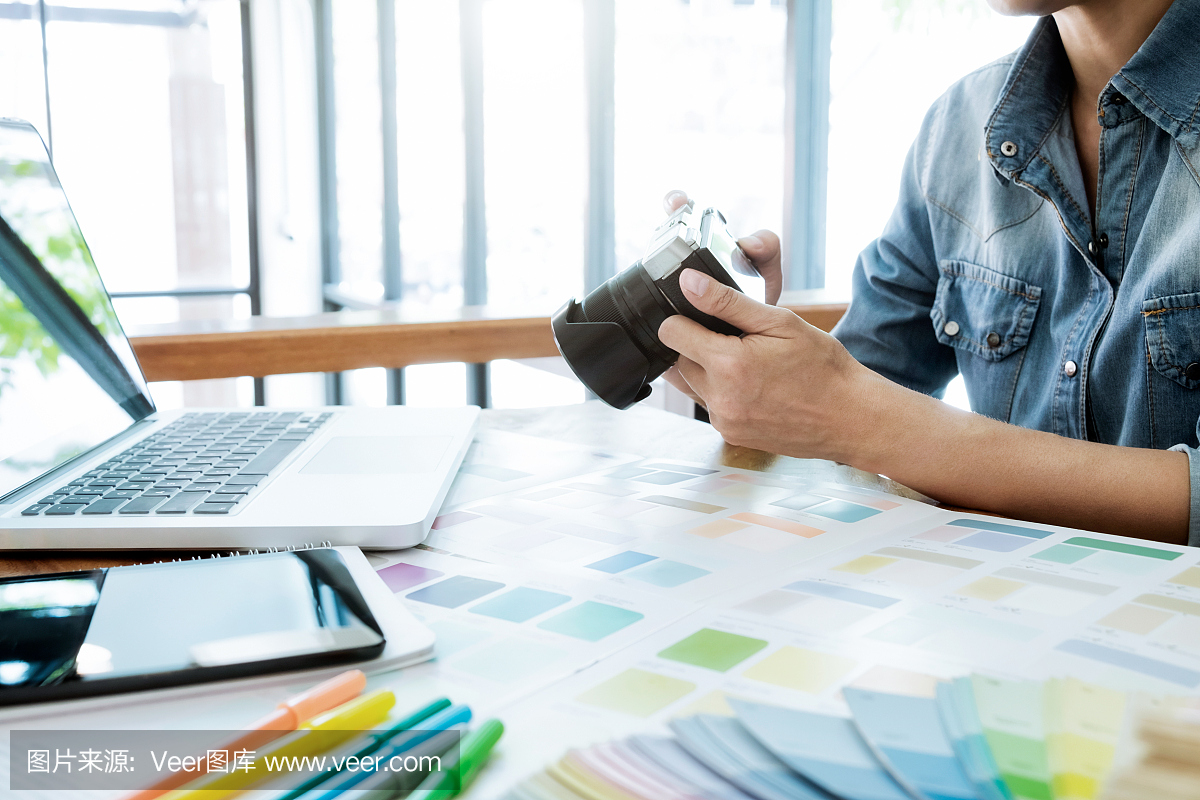 Graphic designer select picture from and choos