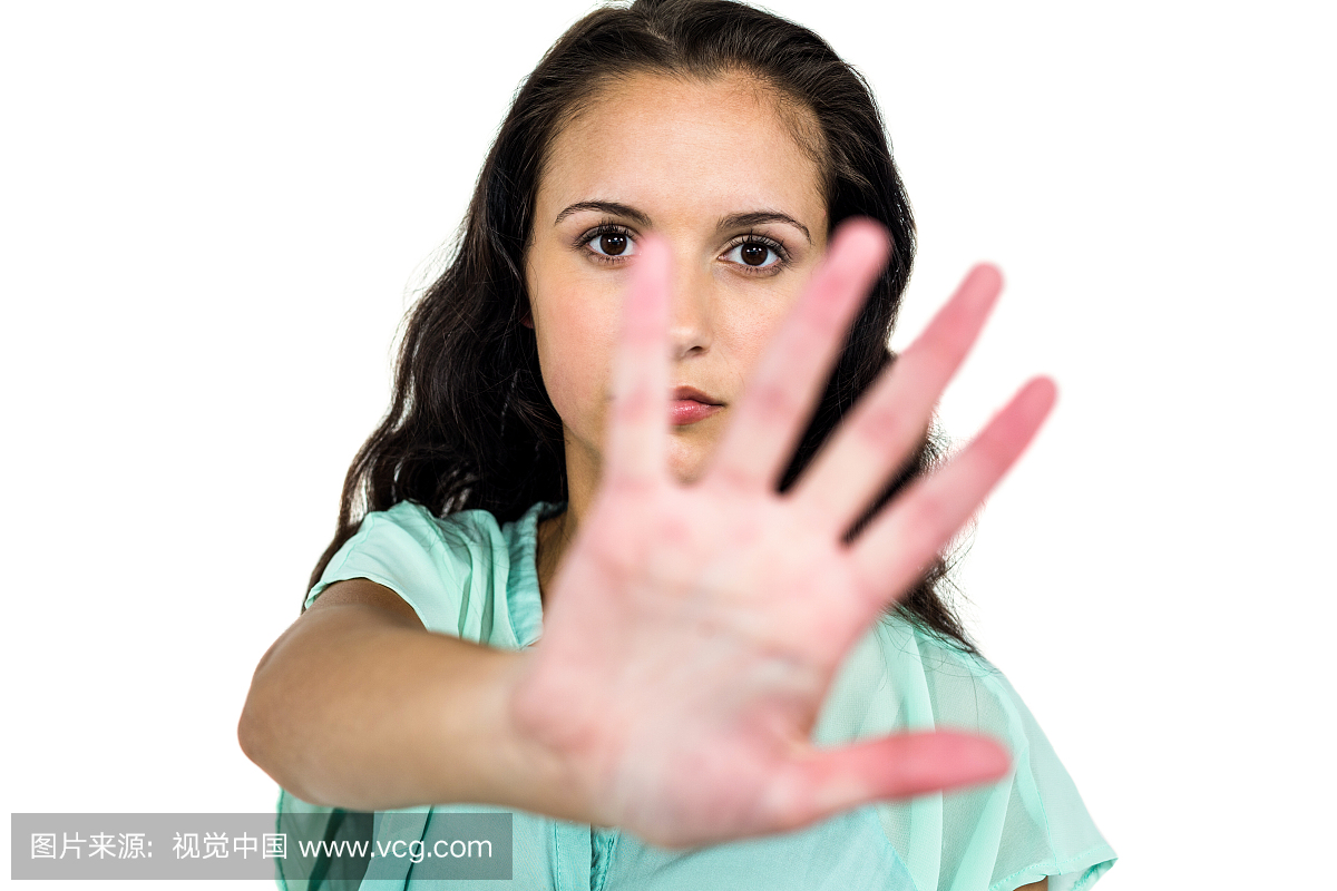 Frowning woman putting hand on c