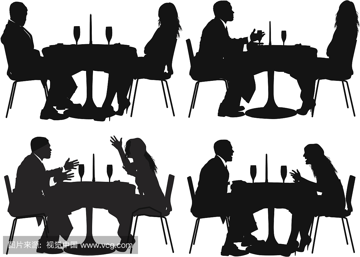 夫妇坐在餐厅的剪影