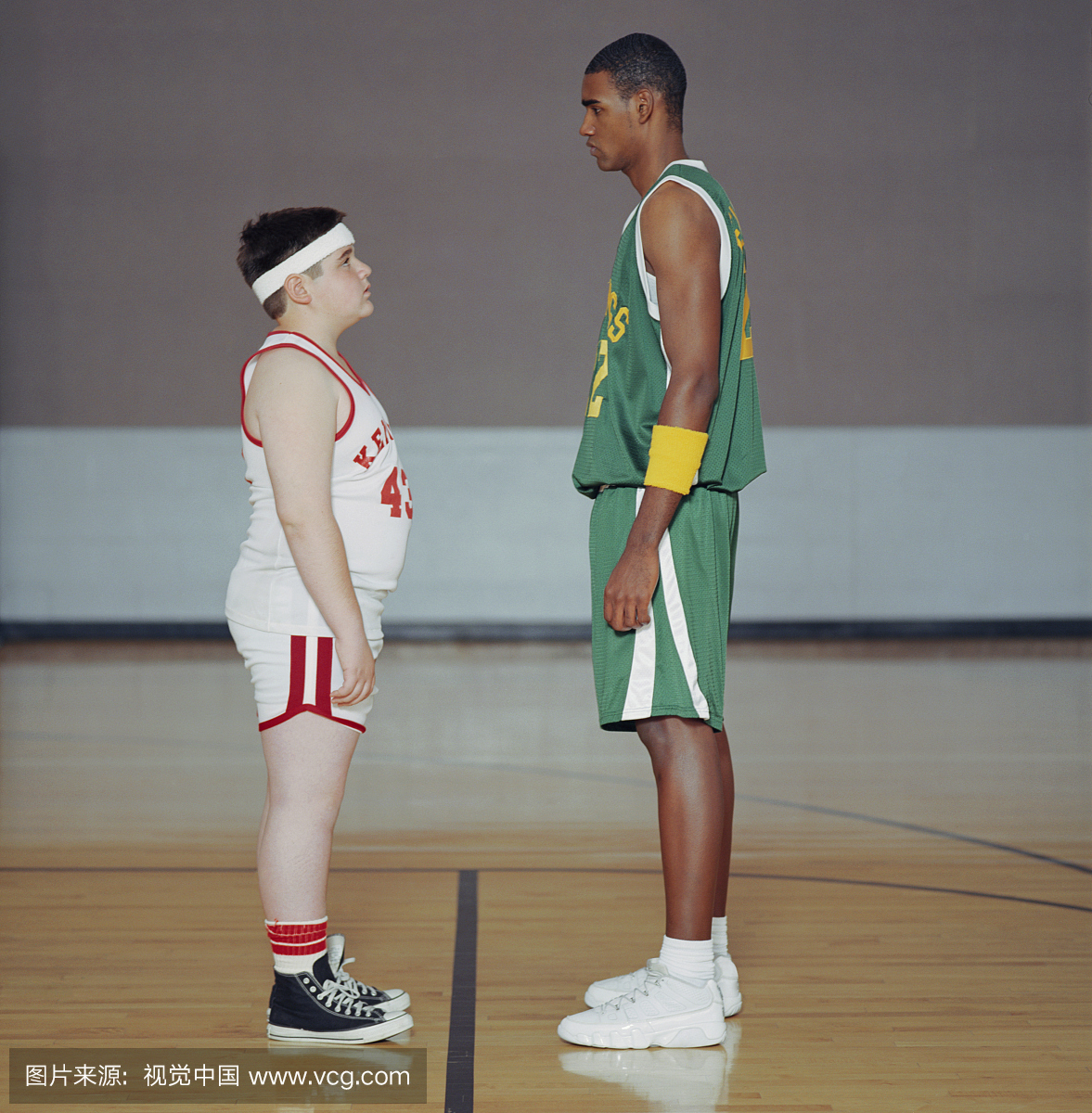 Basketball Player Facing Taller Opponent