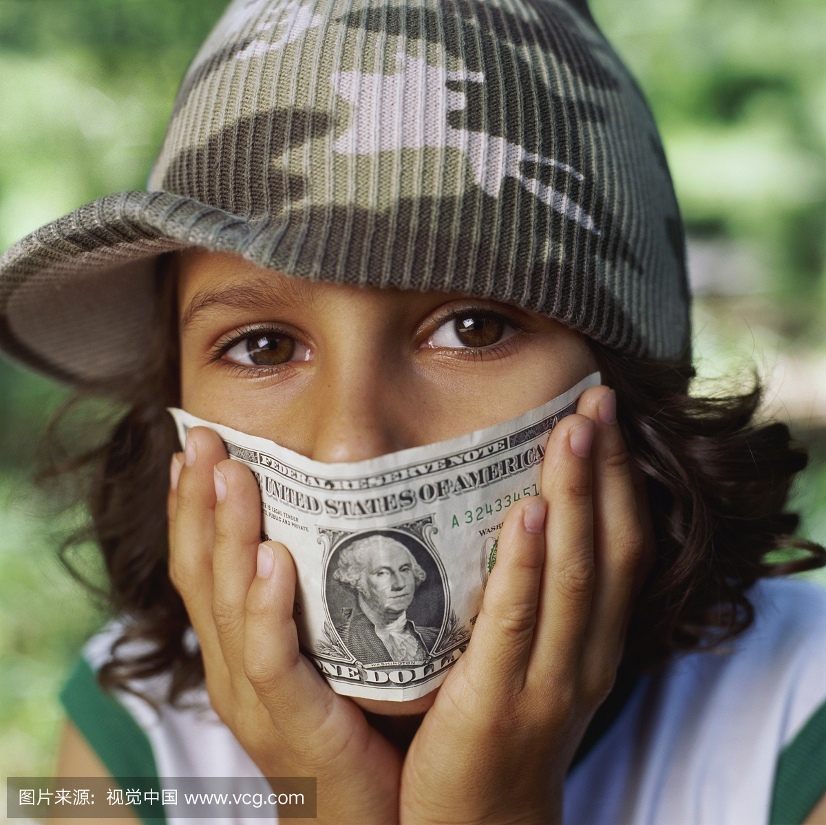 Boy Holding Dollar Bill